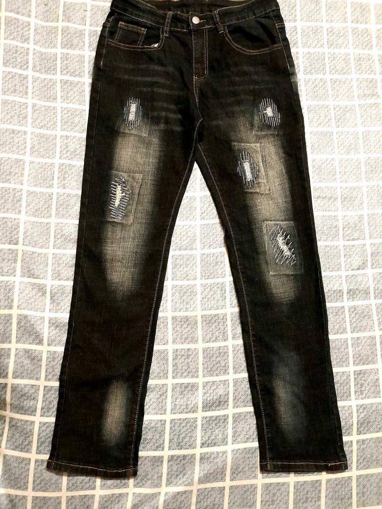 Distressed Denim Jeans