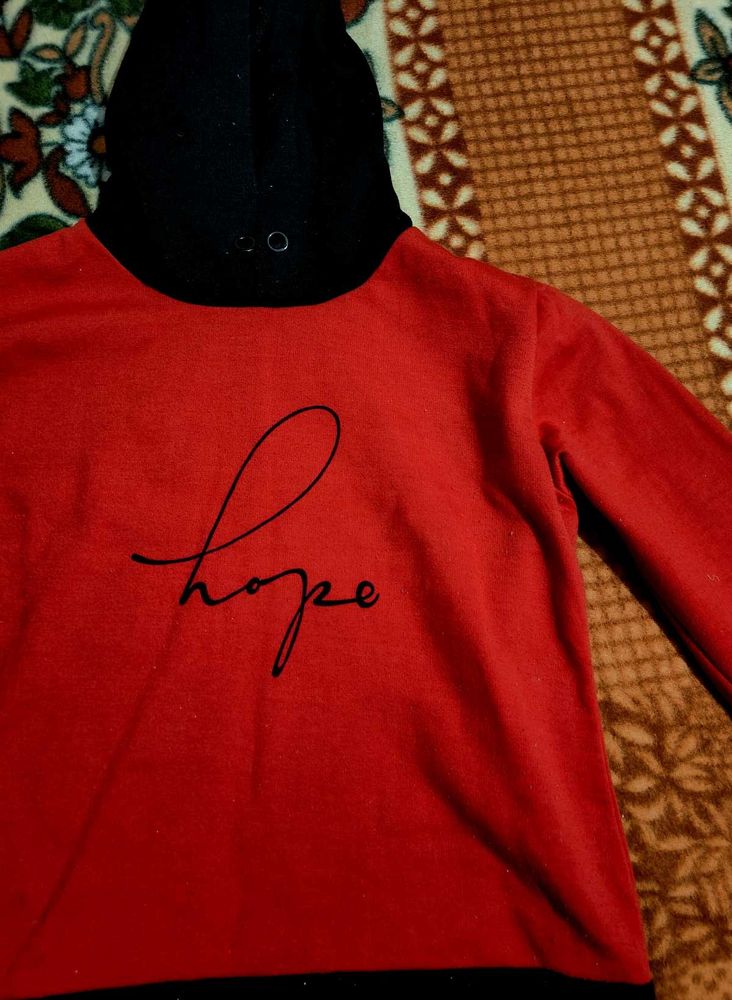 Red Hoodie with 'Hope' Slogan