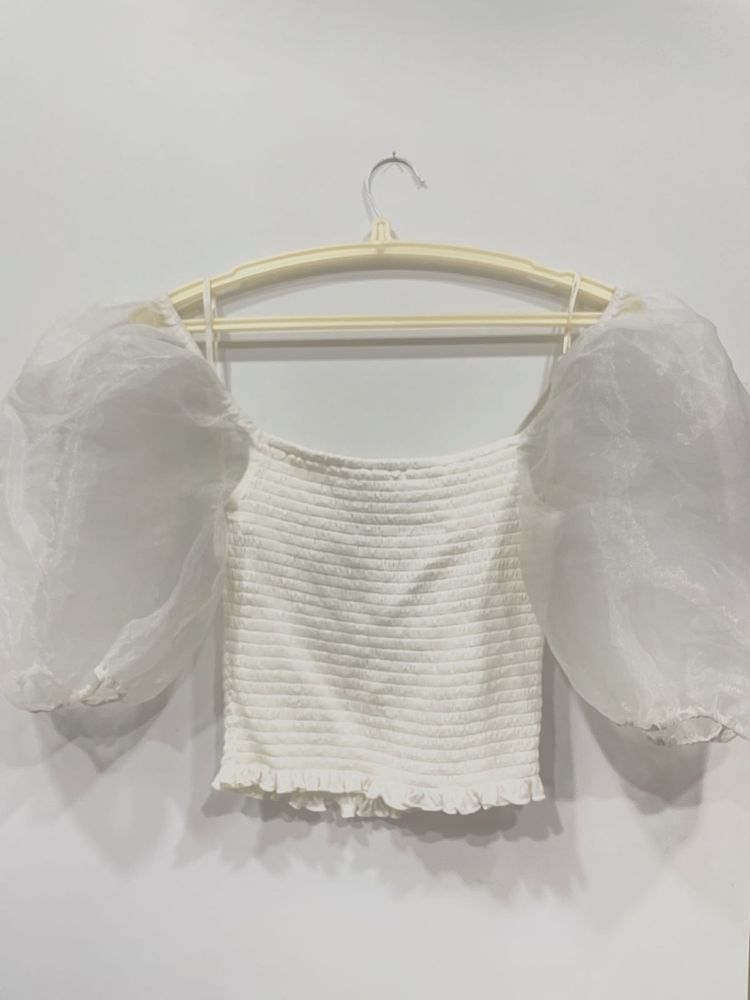White top with organza sleeves