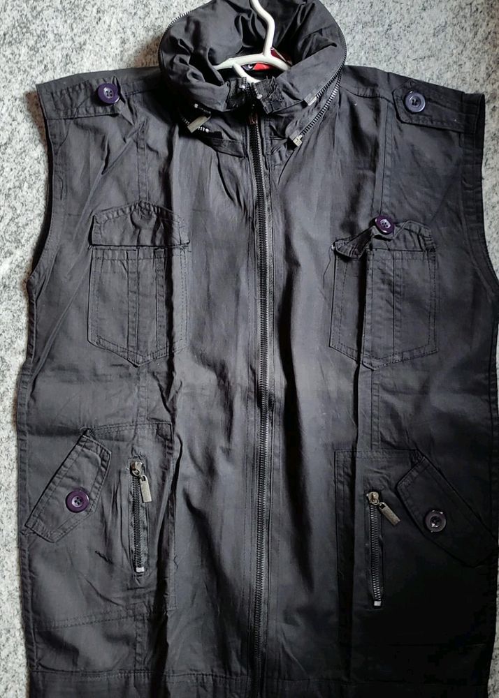 black  sleveless  jacket with hoodie and pockets