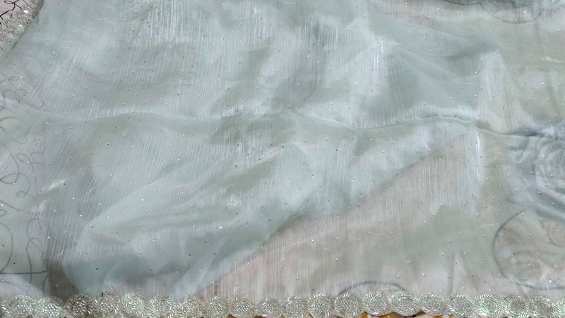 Elegant party organza saree With Stitched Blouse