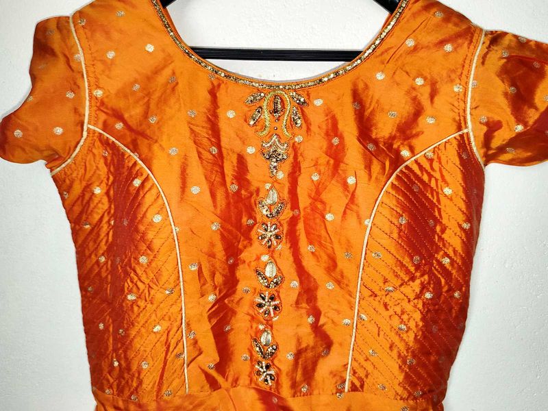 Elegant and traditional floor-length dress.