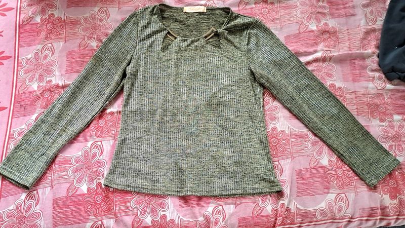 Shimmery Top With Golden Brochure