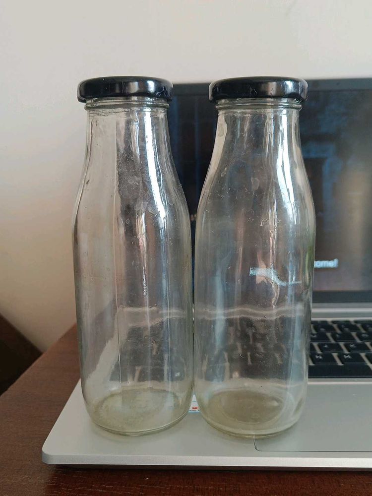 Two Clear Glass Bottles