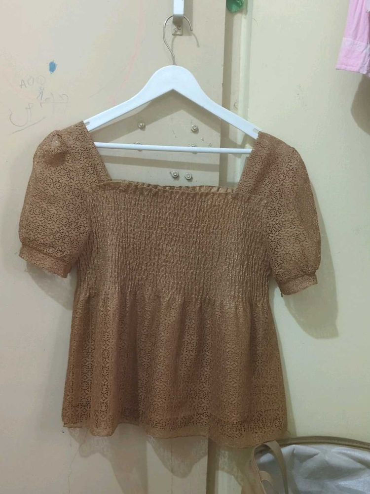 Brown patterned top