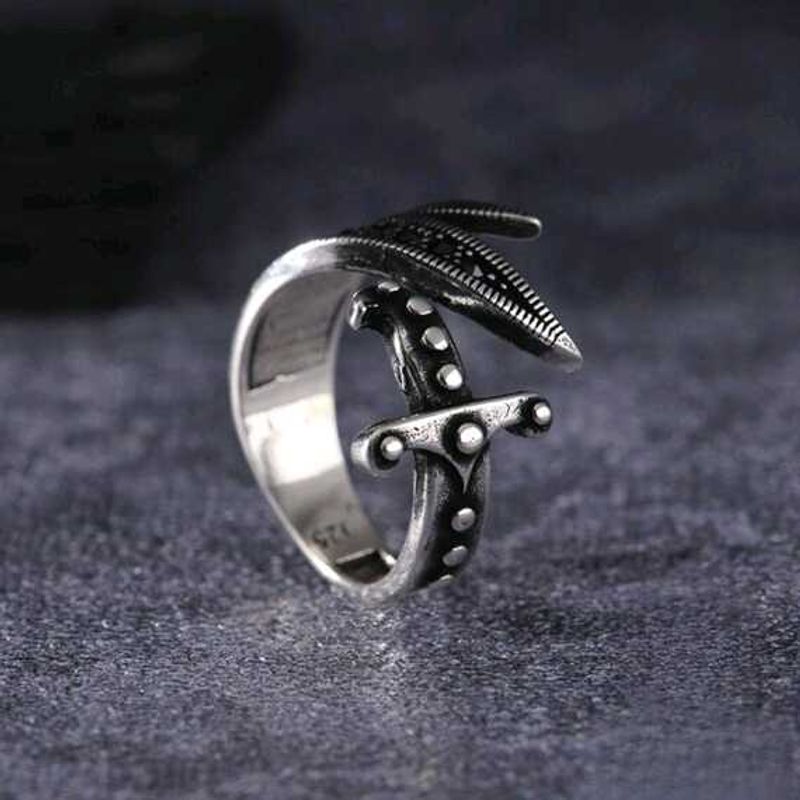 Uniquely Yellow Coloured Eye Silver Sword Ring