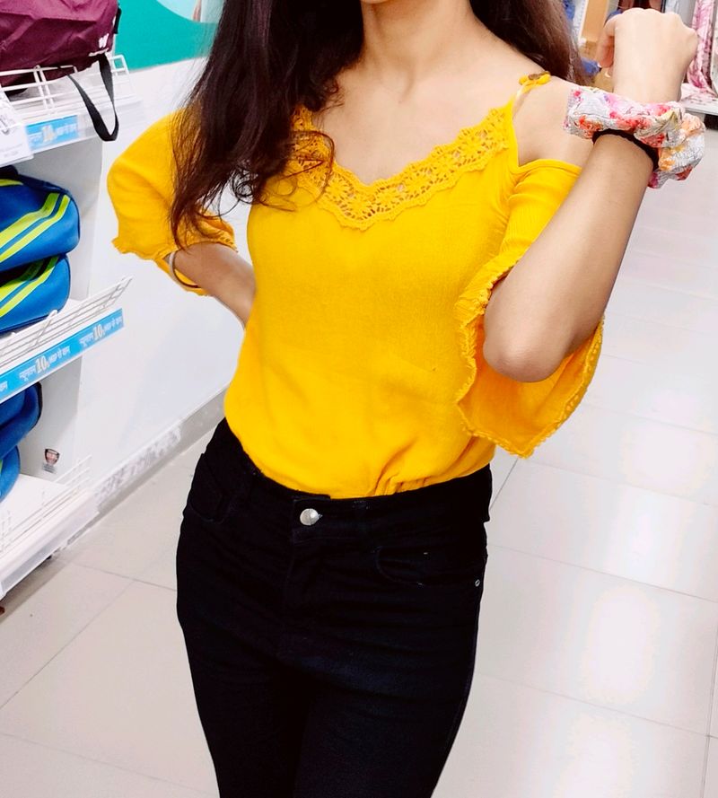 It is Cute Mustard Colored Top From My Closet..
