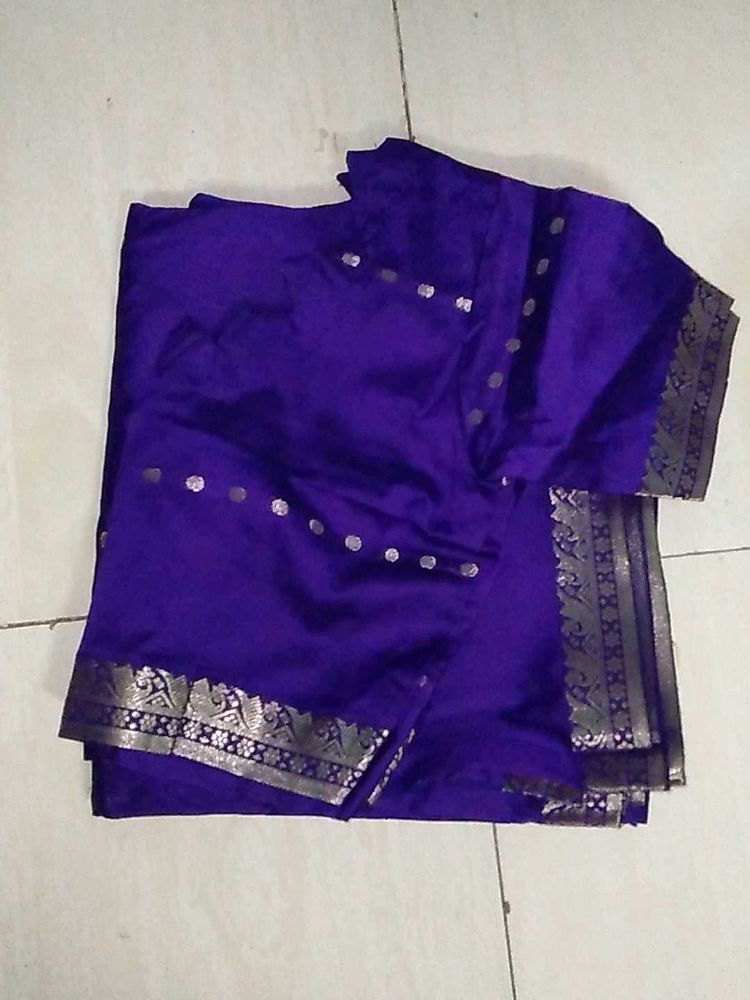 Elegant Purple Saree With Stiched Blouse .