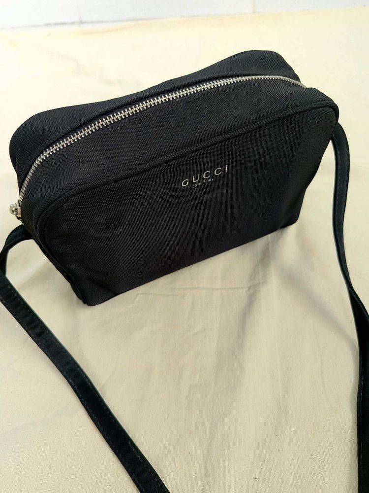Gucci sling (perfume bag)