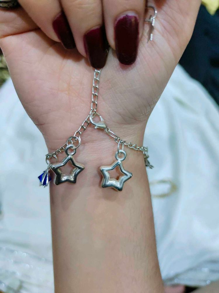 combo of bracelet and 2 rings .