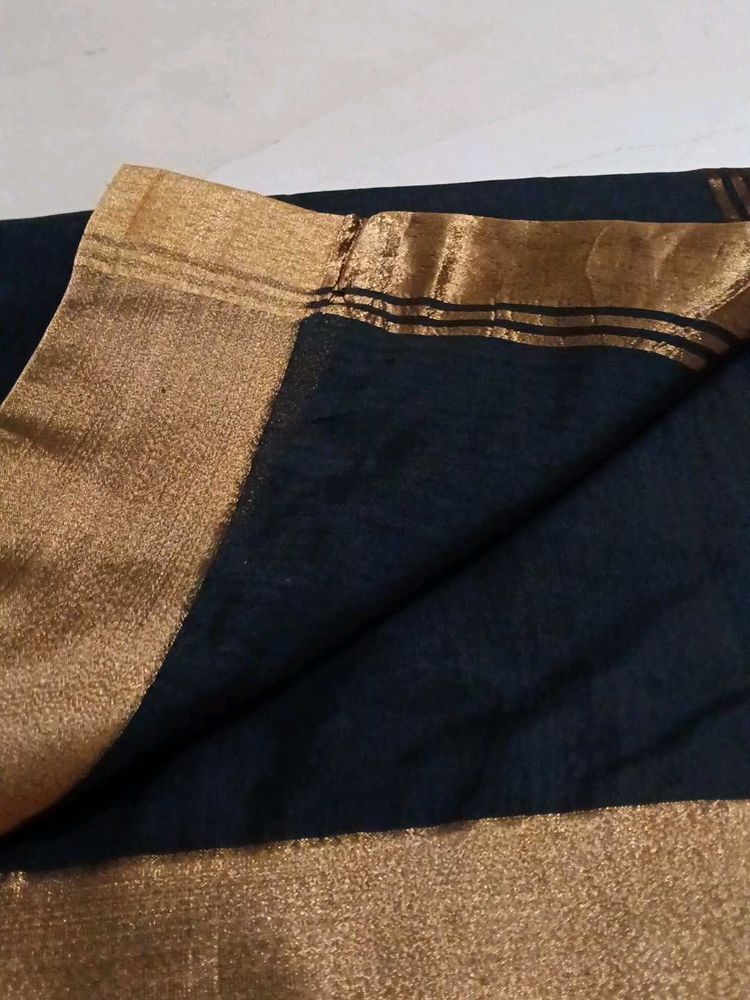 Black saree with golden sare