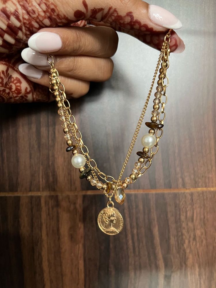 Layered Gold Bracelet With Charm