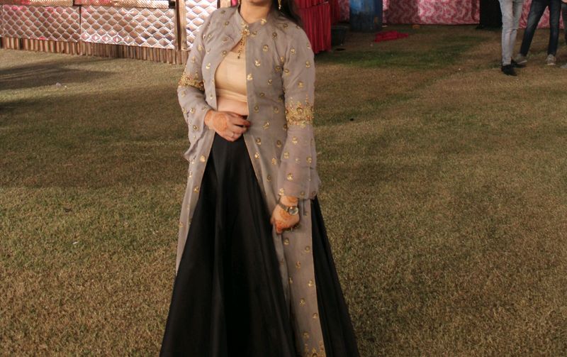 grey jacket with golden heavy embroidery