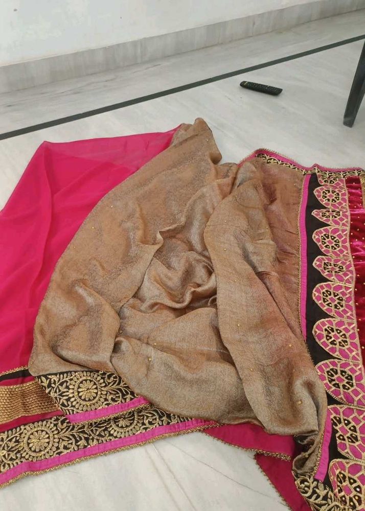 bright pink and golden brown Saree
