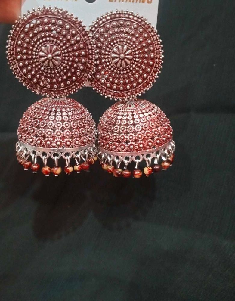 Oxidised jhumka with reddish tint