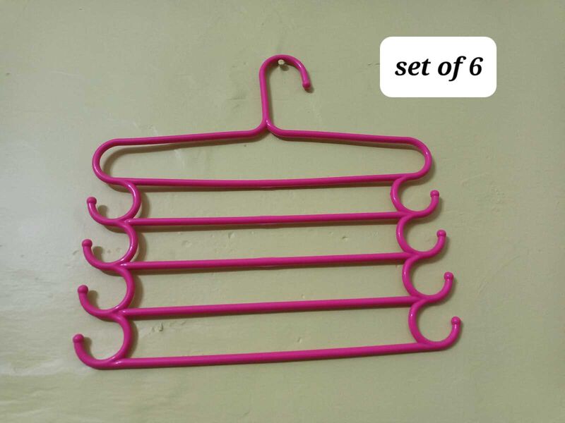 Set of 6 Pink Multi-Tier Hangers.