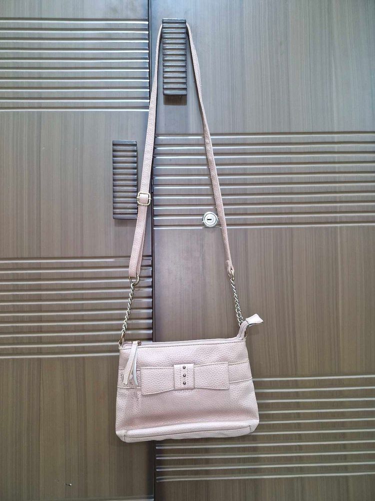 Cute Sling Bag In Peach Colour With Good Space