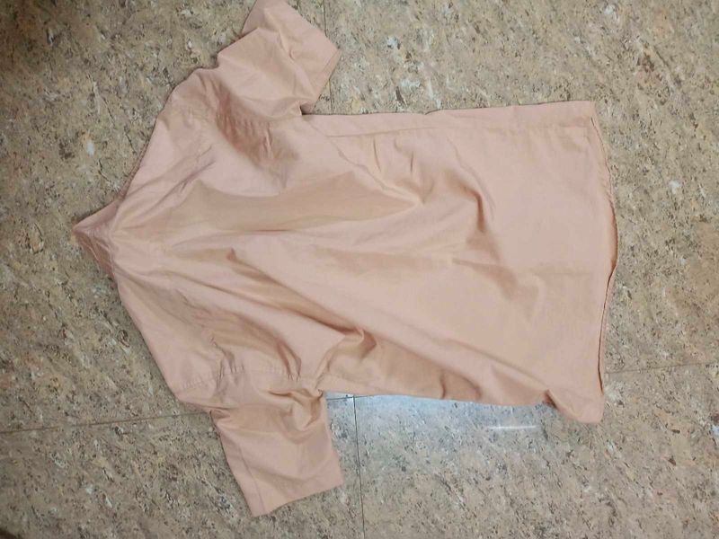 nude color shirt