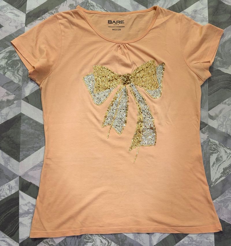 Peach T-shirt with Sequin Bow