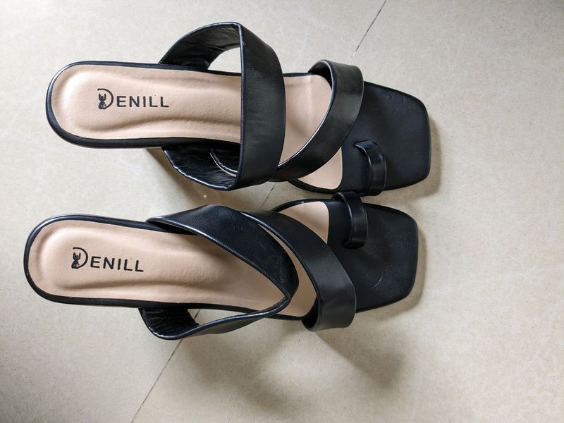 Never used Heels. Selling Because Of Size