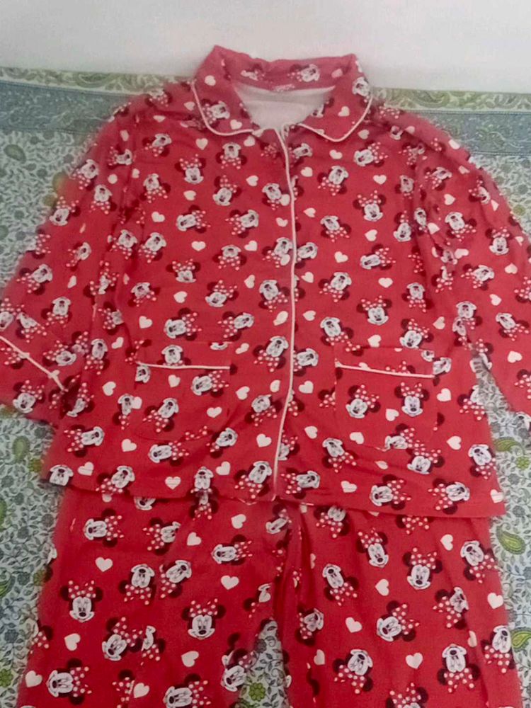 a red night suit gives cozy vibe wth detailings of