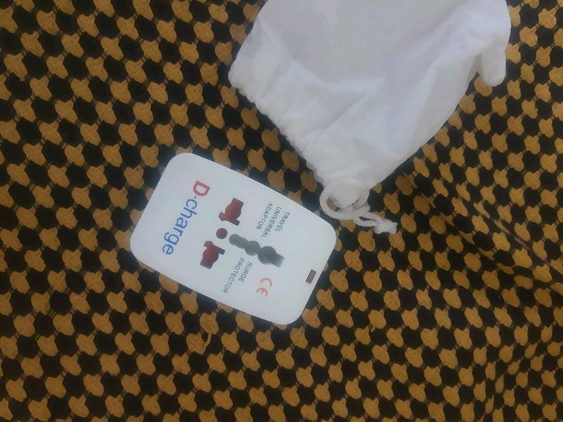 new unused travel friendly adaptor with pouch