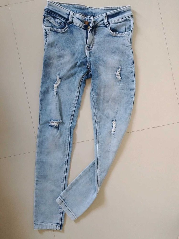 Light Wash Distressed Skinny Jean