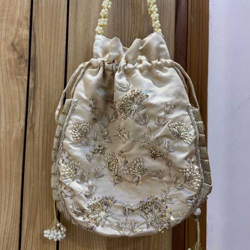 adara khan Zari  Potli ( receipt attached)