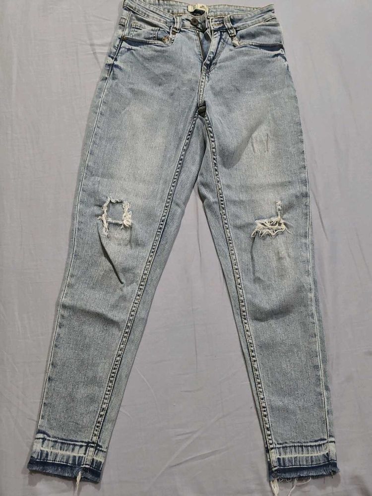 Ripped Light Wash Jeans
