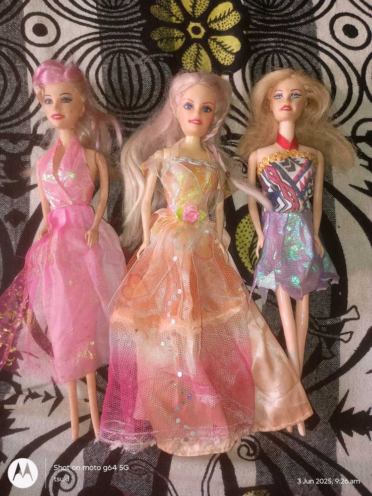 set of 3 Barbie dolls