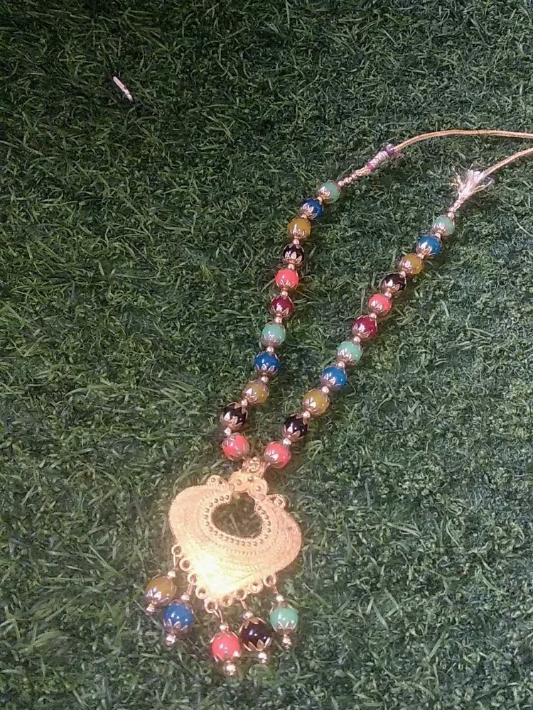 A Beautiful Necklace Which Would Be Perfect On You