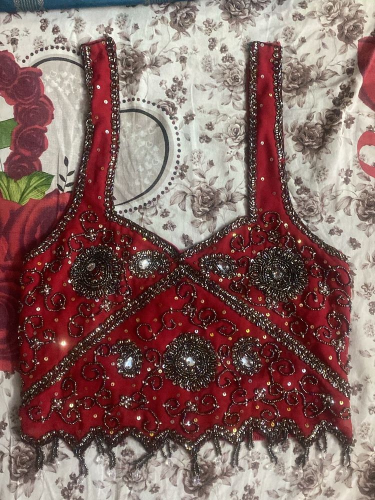 Bright red Heavy work Lehenga and blouse