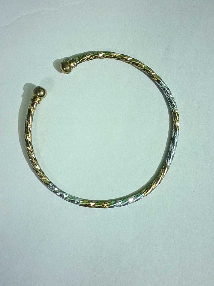Elegant Gold And Silver Bracelet
