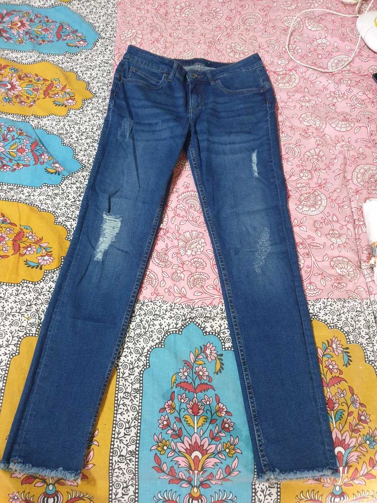 Distressed Denim Jeans