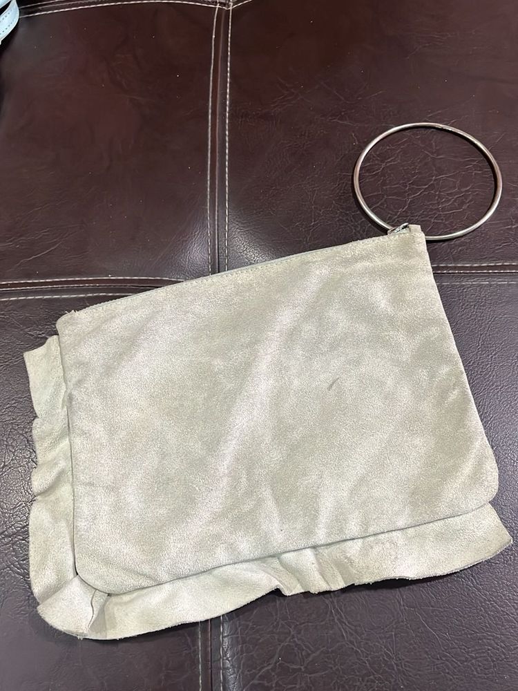 Elegant Ring Handle Clutch