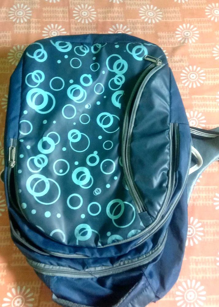 Blue Backpack with Circle Design