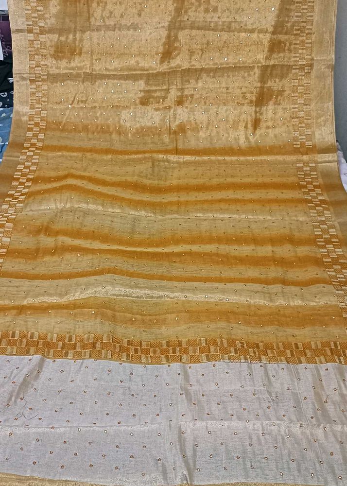 Elegant Mustard Saree with Gold Details