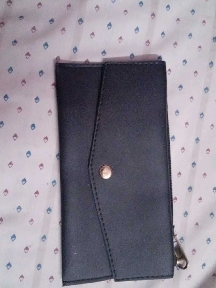 black clutch and guess watch