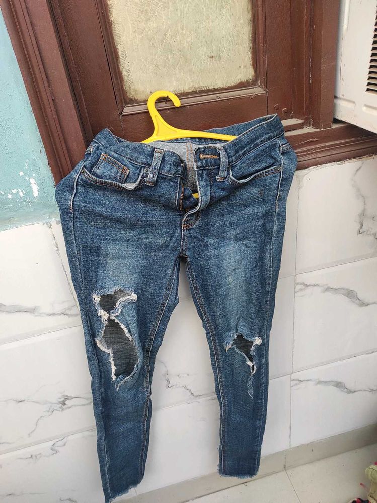 Ripped Knee Denim Jeans