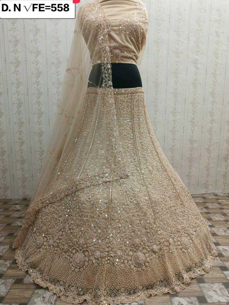 Elegant Beige Embroidered Lehenga Choli