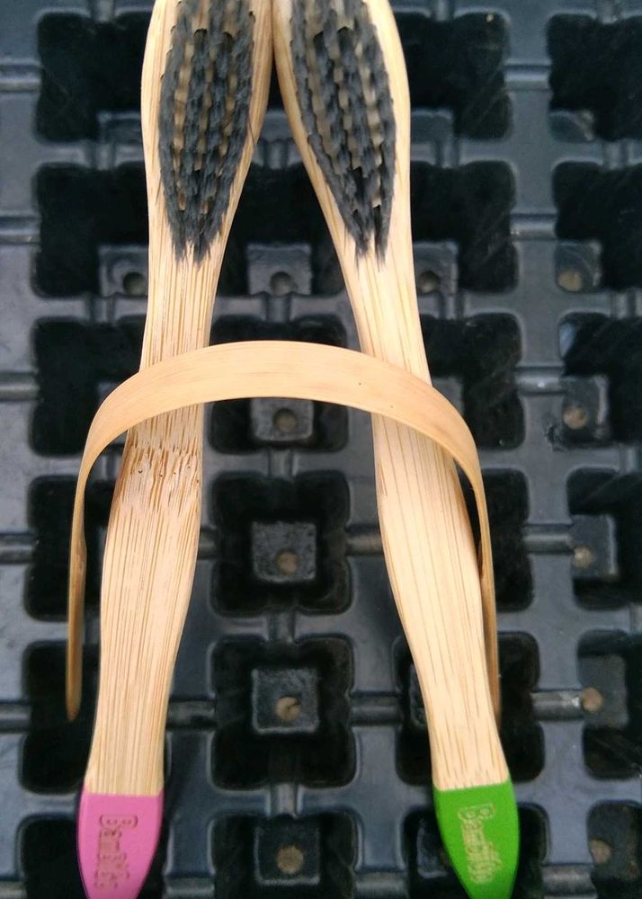 Bamboo Toothbrushes (2) , Tounge cleaner (1)