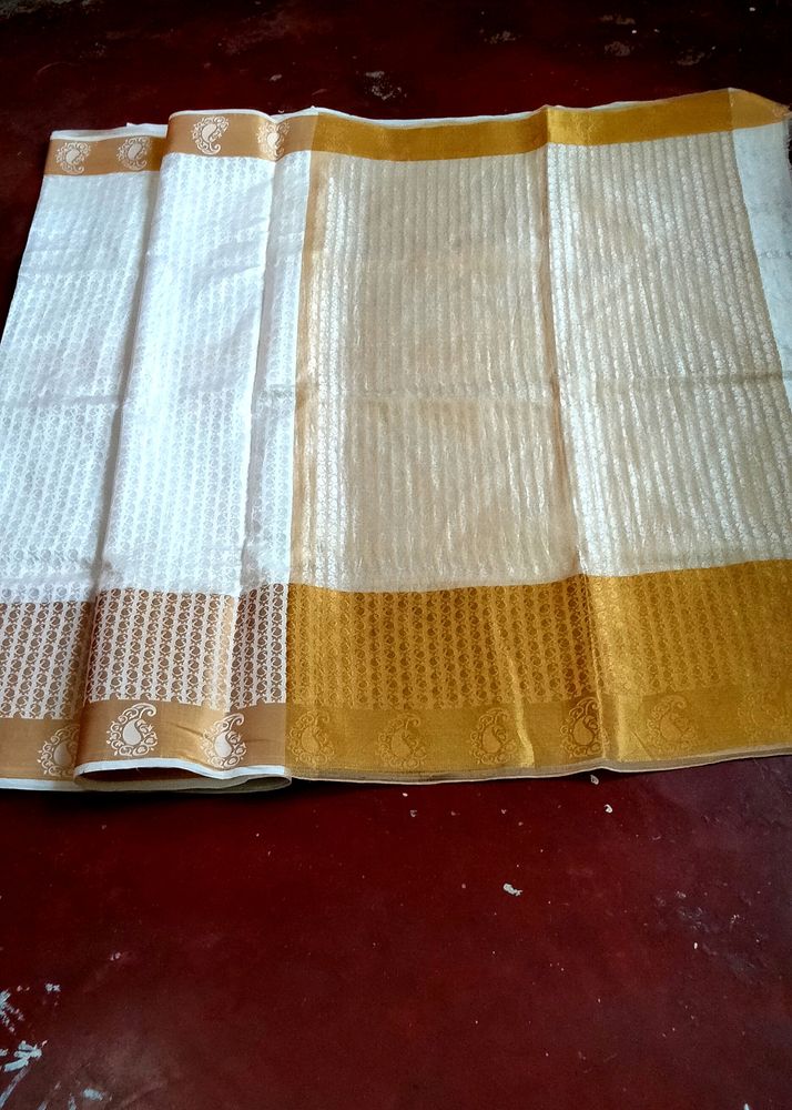 Brown Bordered White Saree For Festivals