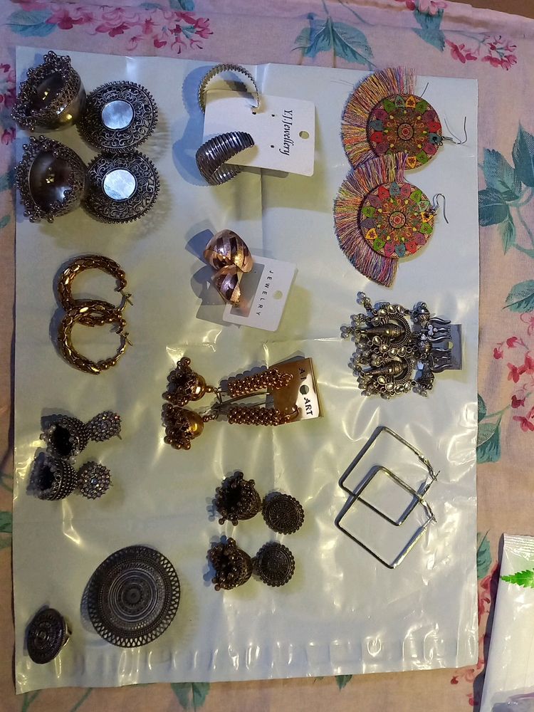 10 Pairs Of Earrings And 2 Finger Rings