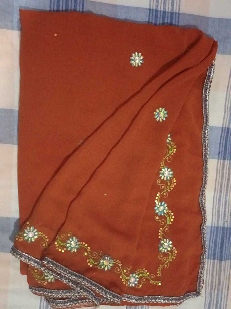 Elegant Brown Embellished Saree
