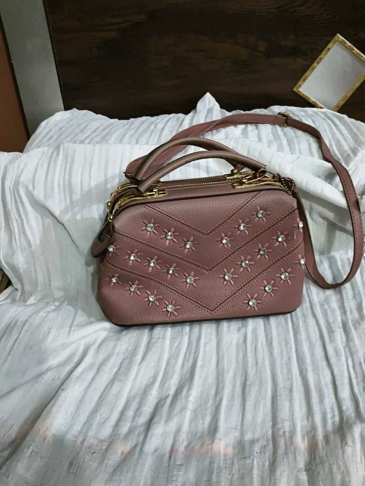 Cute mauve satchel with gems