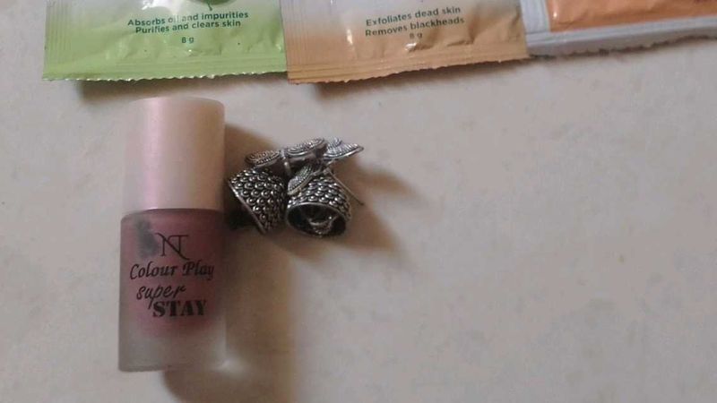 Set of earning nail polish and lip balm
