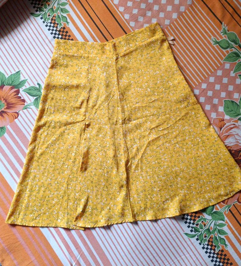 women floral printed high rise side slit skirt.