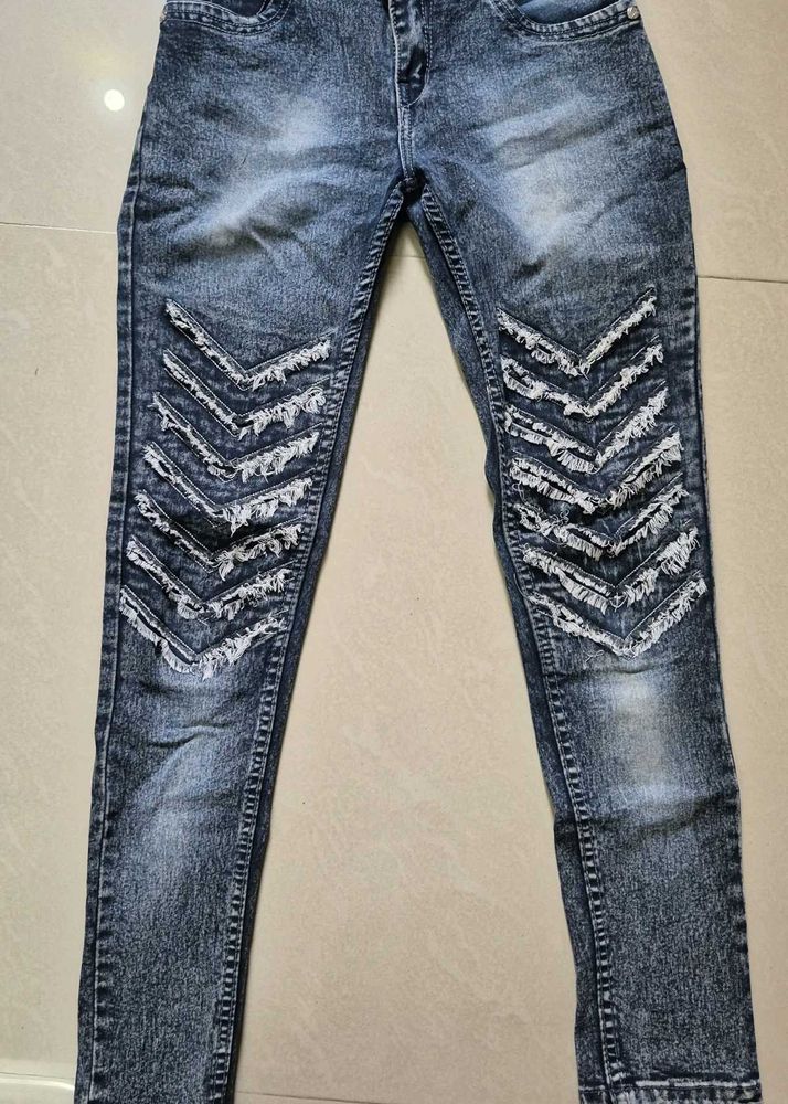 Trendy Distressed Denim Jeans with Chevron Design