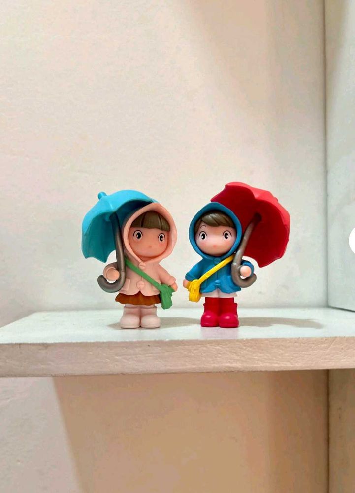 Cute cartoon little girl holding an umbrella