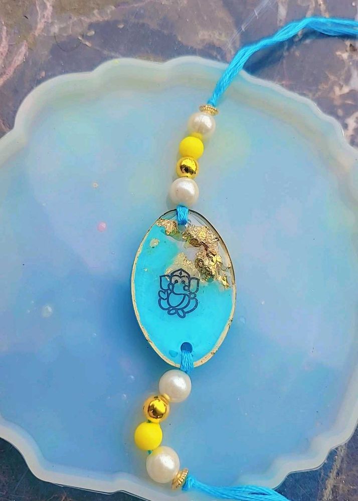 Ganesh Rakhi - Turquoise &amp; Gold